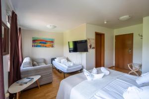 En eller flere senger på et rom på Hotel Skógá by EJ Hotels