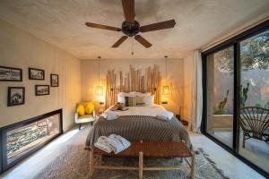 Postel nebo postele na pokoji v ubytování Jardin Sakina - Chambre d'hôtes + 37 fotografií