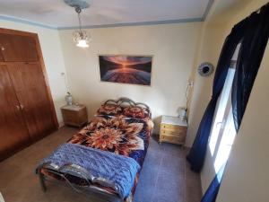 Postel nebo postele na pokoji v ubytování Casa Sionna