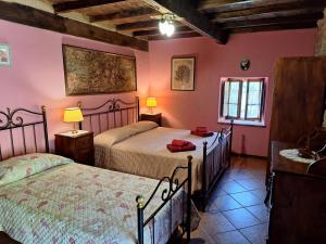 Posteľ alebo postele v izbe v ubytovaní Agriturismo Ristoro del Cavaliere