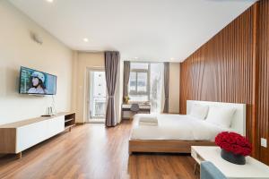 Μια τηλεόραση ή/και κέντρο ψυχαγωγίας στο Jade house Hồ Con Rùa