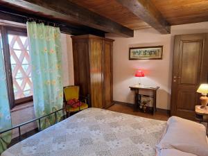 Posteľ alebo postele v izbe v ubytovaní Agriturismo Ristoro del Cavaliere