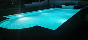 Bazén v ubytování Oasi delle Querce Luxury Home nebo v jeho okolí