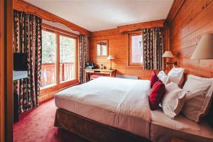 Кровать или кровати в номере Hotel Mont Vallon