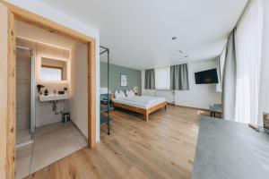 Rúm í herbergi á Fairrooms - Self-Check-In