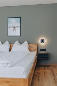 Rúm í herbergi á Fairrooms - Self-Check-In