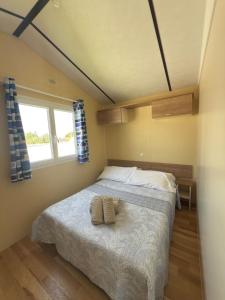 Postel nebo postele na pokoji v ubytování Casita la ilusión