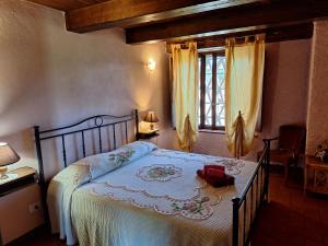 Posteľ alebo postele v izbe v ubytovaní Agriturismo Ristoro del Cavaliere