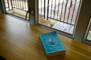 a book sitting on top of a table at Waveflo Hostel 浪花青旅 in Hong Kong