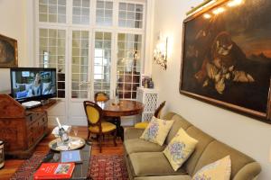 TV a/nebo společenská místnost v ubytování Villa Claudia dei Marchesi Dal Pozzo