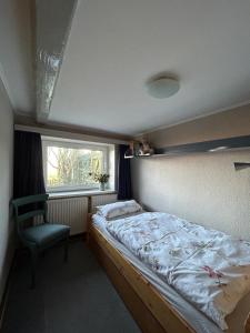Postel nebo postele na pokoji v ubytování Kalle´s Reethus
