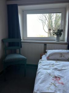 Postel nebo postele na pokoji v ubytování Kalle´s Reethus
