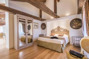 A bed or beds in a room at Al Redentore Di Venezia