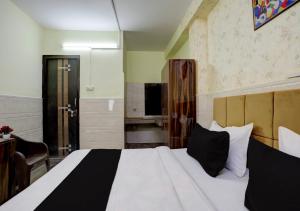 Postel nebo postele na pokoji v ubytování Hotel Vista 18 Inn Couple Friendly