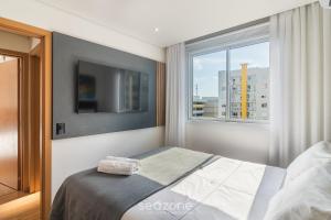 Postel nebo postele na pokoji v ubytování VAC - Condomínio beira mar na Praia de Itajubá + 195 fotografií