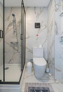 Koupelna v ubytování Apartment Lampėdis by Polo Apartments + 13 fotografií