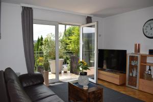 TV a/nebo společenská místnost v ubytování Ferienwohnung Ahrtalblick