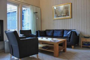 a living room with a couch and a coffee table at Feenwald - Baabe in Baabe