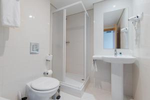 Un baño de Hotel Azinheira by RIDAN Hotels