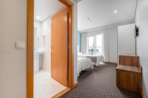 Un baño de Hotel Azinheira by RIDAN Hotels