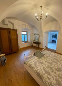 Posteľ alebo postele v izbe v ubytovaní Apartmán Modrý dom 1