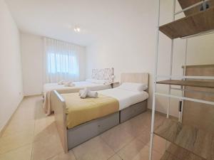 เตียงในห้องที่ 2a Línea de Mar, Playa de Lloret, Centro Histórico