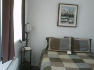 Postel nebo postele na pokoji v ubytování Motel Leblanc