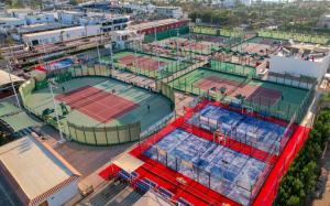 an aerial view of tennis courts on a city at Royal Savoy Sharm El Sheikh in Sharm El Sheikh