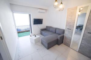A television and/or entertainment centre at Zer, Nea Irakleia 630 80, Greece
