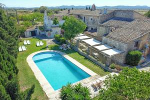 an aerial view of a house with a swimming pool at Agroturismo Finca Son Valls - Adults Only in Felanitx