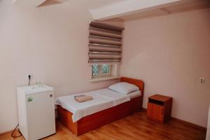 Postel nebo postele na pokoji v ubytování Malibu Guest House