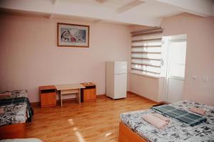 Postel nebo postele na pokoji v ubytování Malibu Guest House