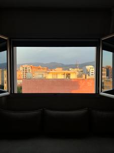 a view of a city from a window at Nara luxe 3 Berkane in Berkane