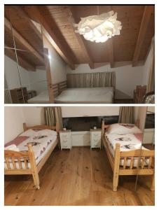 Postel nebo postele na pokoji v ubytování Chalet Matterhornsicht