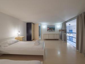 Postel nebo postele na pokoji v ubytování I-Host apartment - Ausonio 16