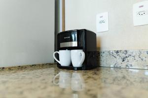 SM1116 Apart Hotel em andar alto região central的咖啡和沏茶工具