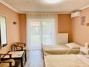 Postel nebo postele na pokoji v ubytování Villa Lux