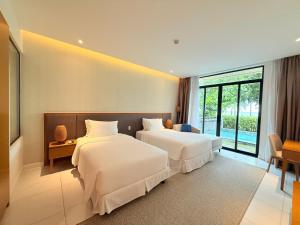 Ένα ή περισσότερα κρεβάτια σε δωμάτιο στο Villa 3BR Beach Front +48 φωτογραφίες