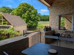 En balkon eller terrasse på Chez Max et Juliette - Charmante maison familiale en bordure de forêt