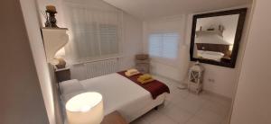 A bed or beds in a room at casa santa caterina