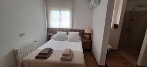 A bed or beds in a room at casa santa caterina