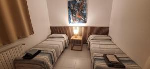 A bed or beds in a room at casa santa caterina