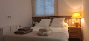 A bed or beds in a room at casa santa caterina