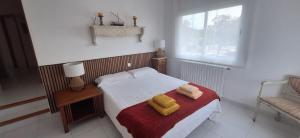 A bed or beds in a room at casa santa caterina Még 37 kép