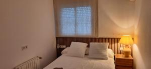 A bed or beds in a room at casa santa caterina