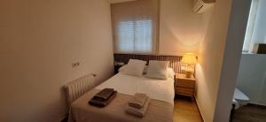 A bed or beds in a room at casa santa caterina