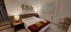 A bed or beds in a room at casa santa caterina