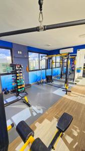 a gym with treadmills and equipment in a building at Luxuoso apê recém reformado na Farolândia in Atalaia Velha