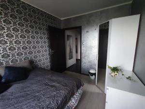 Postel nebo postele na pokoji v ubytování Pokój na wynajem w Gdyni + 5 fotografií