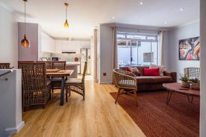 a living room with a couch and a table at C Breeze 2 & 11 in Swakopmund